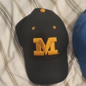New Era Black Cap with Gold M Emblem